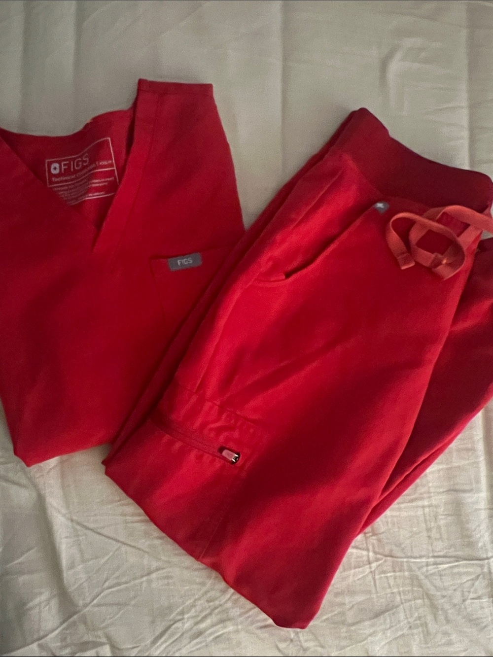 FIGS Zamora and Catarina top in color Pop Red